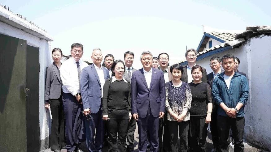 王亚军走访慰问文川市旅朝华侨